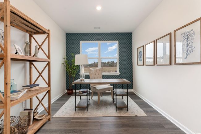 Office featuring an accent wall, dark wood-style floors, and recessed lighting | Image 23