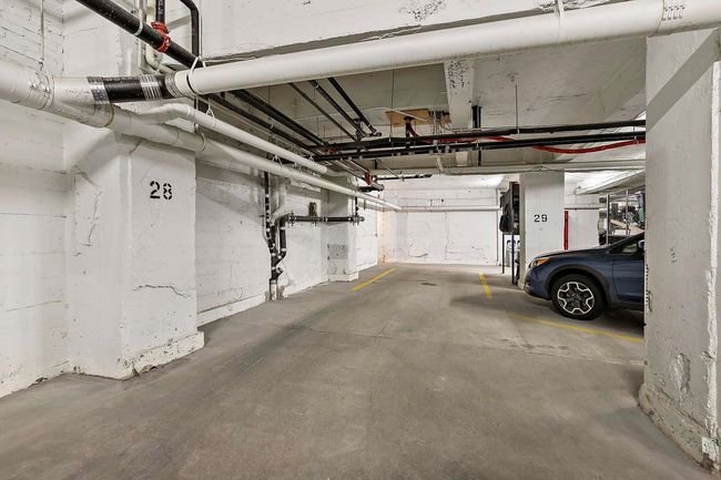 This unit comes with heated underground parking space #28. Sellers also installed a large cage for storage. | Image 38