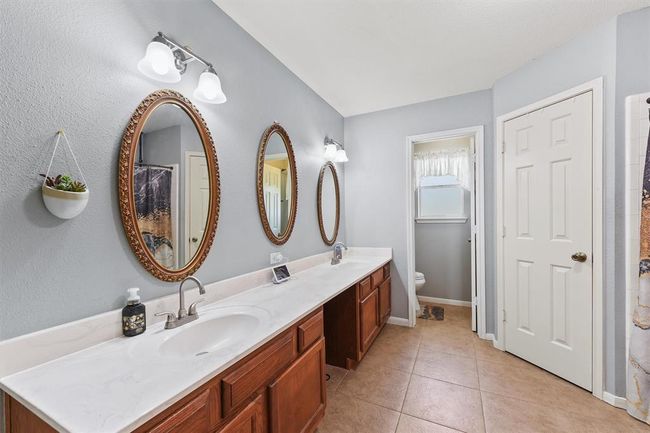 Primary bathroom with double sinks and double closets | Image 18