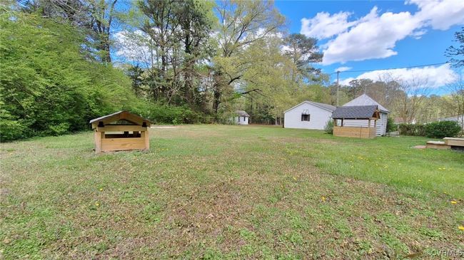 View of yard with an outbuilding | Image 46