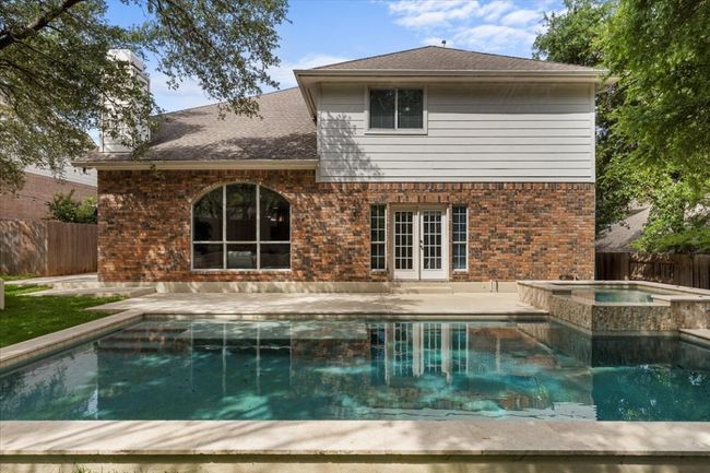 Custom built pool with ample decking for relaxation | Image 29