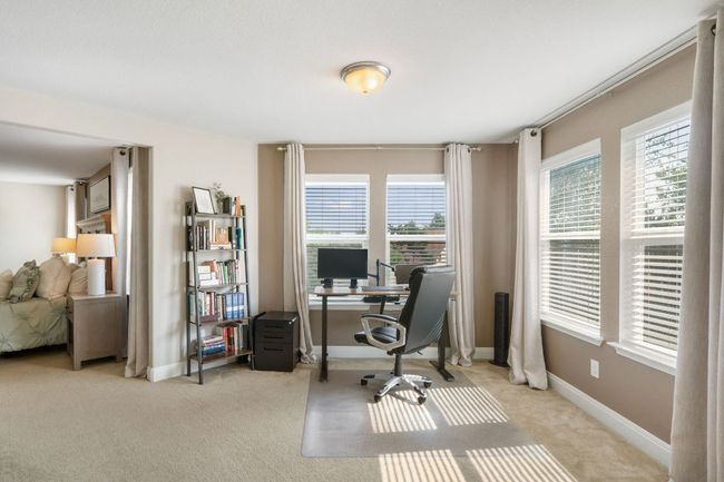 flex space off primary bedroom can be used as an office, sitting room, or nursery | Image 22