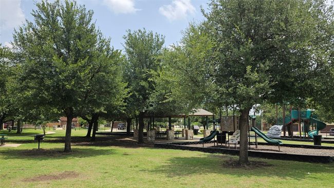 Communal playground with a lawn | Image 12
