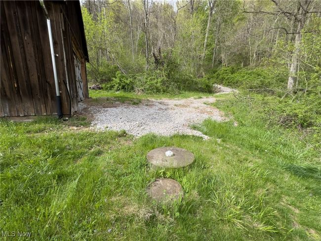 View of yard with a view of trees | Image 28