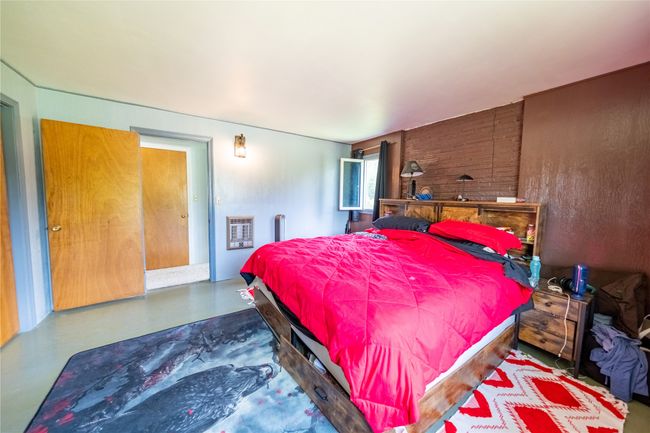 Bedroom featuring heating unit | Image 43