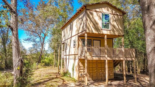 614 River Lakes Rd, Goodrich, TX, 77335 | Card Image