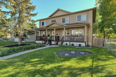 2417 53 Ave Sw, Home with 4 bedrooms, 2 bathrooms and 2 parking in Calgary AB | Image 2