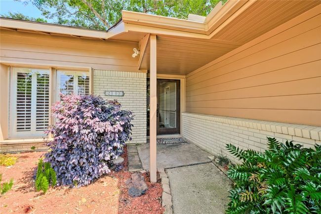 Inviting Entry with lucious landscaping | Image 4