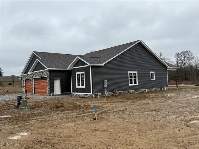 View of front of property with a garage | Image 21