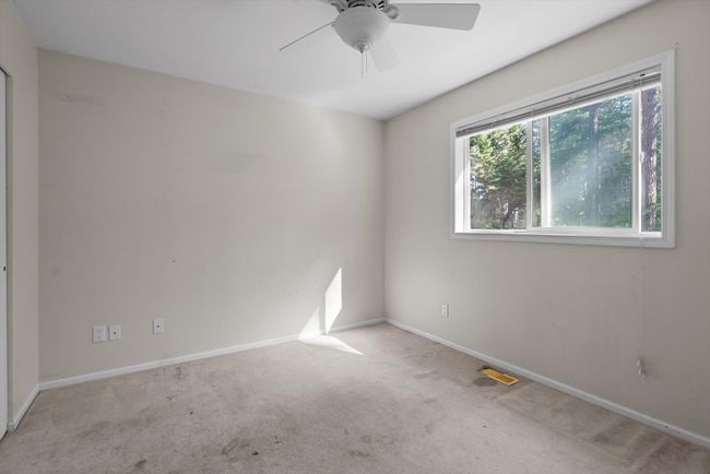 Bedroom #2 with a ceiling fan | Image 19