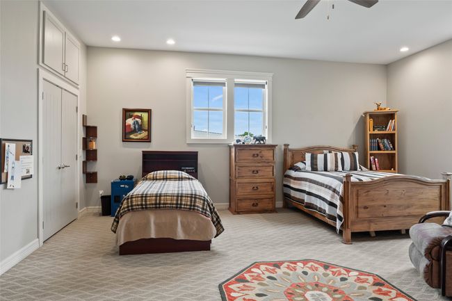 Bedroom with light carpet, ceiling fan, recessed lighting, and baseboards | Image 21