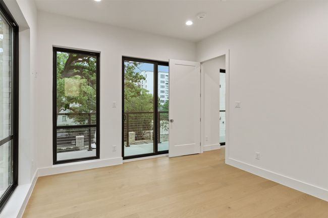 2nd bedroom with floor to ceiling windows | Image 16