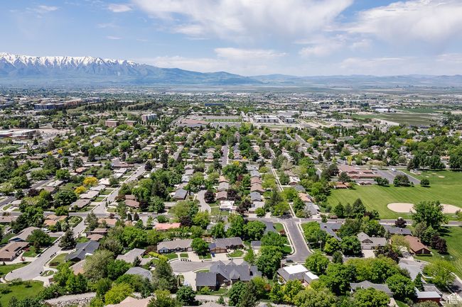 Aerial perspective of suburban area with a mountain backdrop | Image 114
