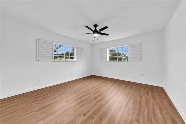 with Walk-in Closet, Plantation Shutters & New Ceiling Fan | Image 21