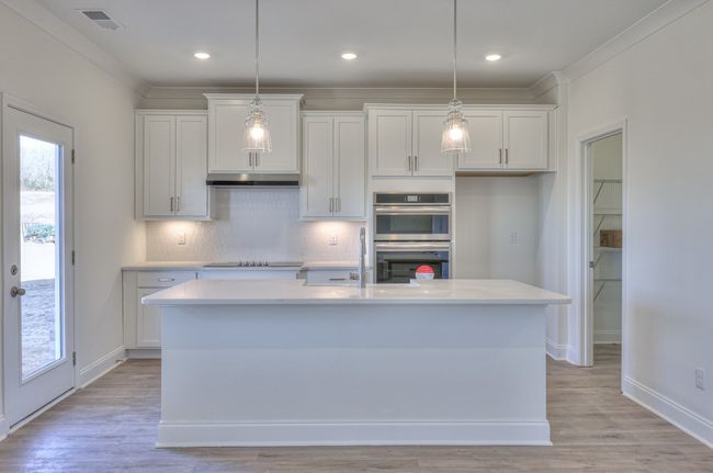 Picture is of the same floor plan in a completed home, selections may vary. | Image 12