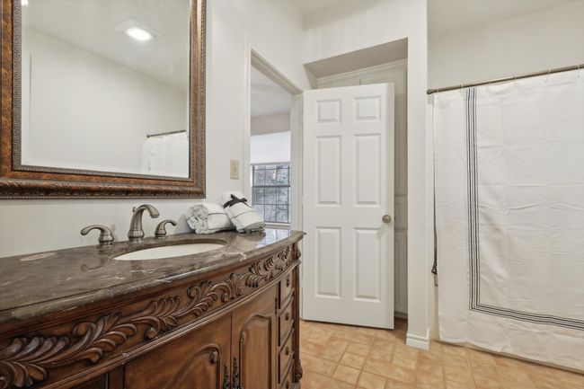 Bathroom 1st floor featuring vanity and curtained shower | Image 24