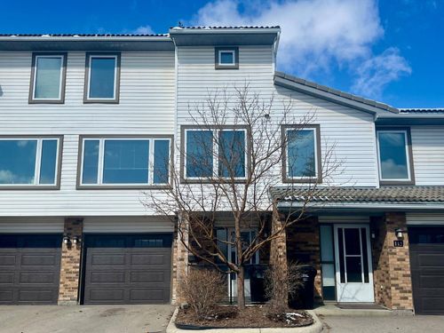 117 Coachway Lane Sw, Home with 3 bedrooms, 2 bathrooms and 2 parking in Calgary AB | Card Image