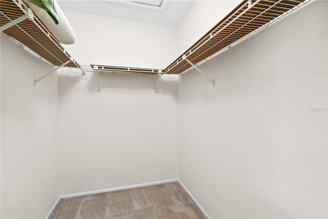 walk in closet in master bedroom | Image 21