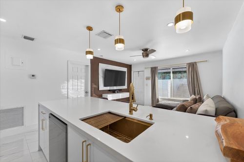 883 Ne 33rd St, Oakland Park, FL, 33334-2713 | Card Image