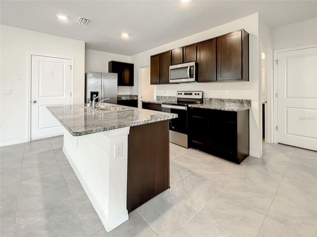 10556 Penny Gale Loop, House other with 5 bedrooms, 4 bathrooms and null parking in SAN ANTONIO FL | Image 17