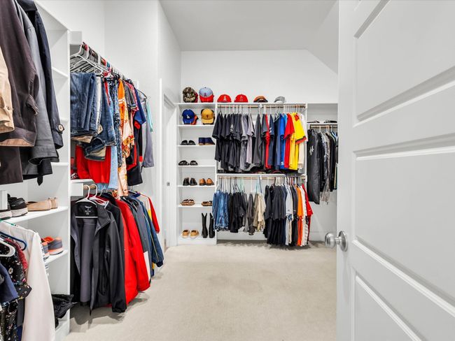 Spacious closet with built-in shelving. | Image 20