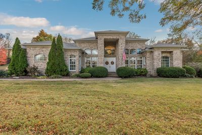 Beautiful one level home on 5 private acres with pool and detached building/barn. | Image 1