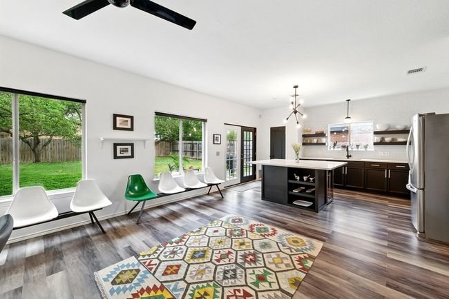 Entrance foyer with visible vents, baseboards, and wood finished floors | Image 5