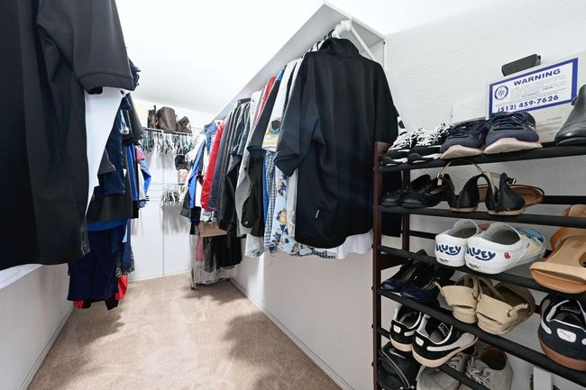 Spacious closet with carpet | Image 26