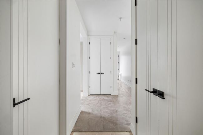 Hall featuring baseboards | Image 22