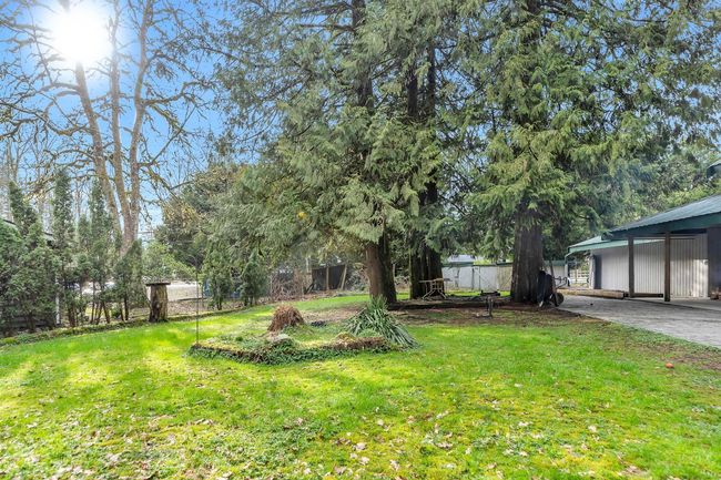 View of yard featuring fence | Image 38