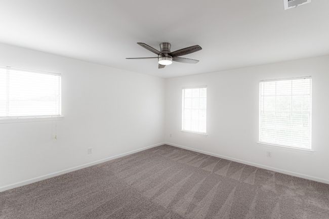 The primary bedroom features carpet that was installed in April 2024. | Image 25