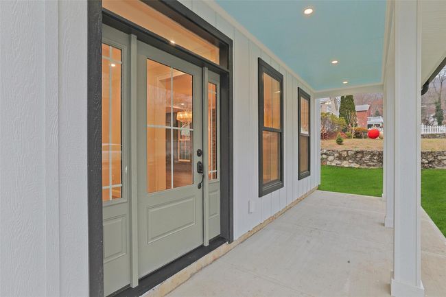 Front entrance, elegant door with sidelights and transom. | Image 4