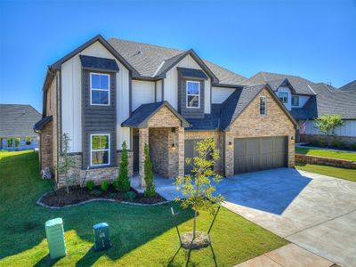 View of front of home with a front yard and a garage | Image 3