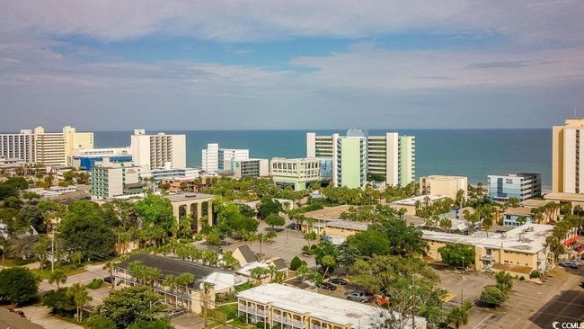 View of urban area featuring a nearby body of water | Image 39