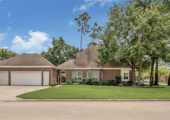 Three car garage and premium corner lot. | Image 38