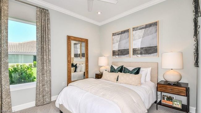 Carpeted bedroom with crown molding, baseboards, a ceiling fan, and recessed lighting | Image 14