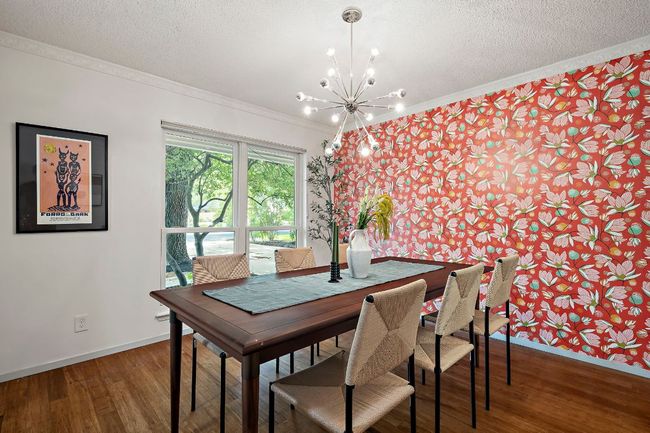 Natural light pours into the formal dining space, creating an inviting ambiance | Image 17