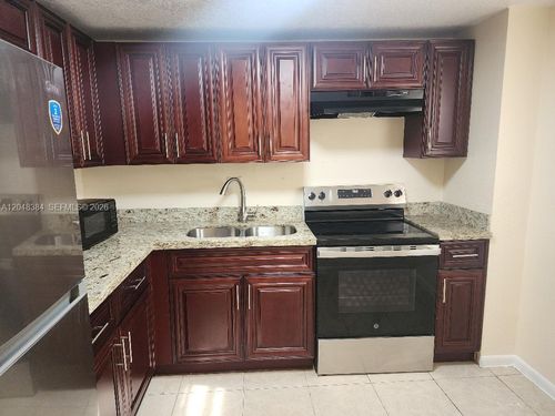 2e-1700 Nw 58th Ter, Sunrise, FL, 33313-6937 | Card Image