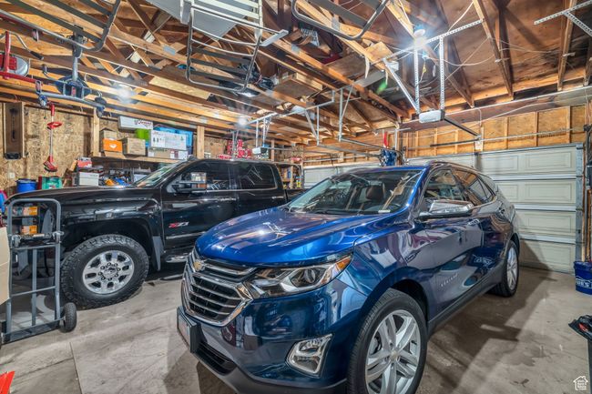 Garage featuring electric panel | Image 24