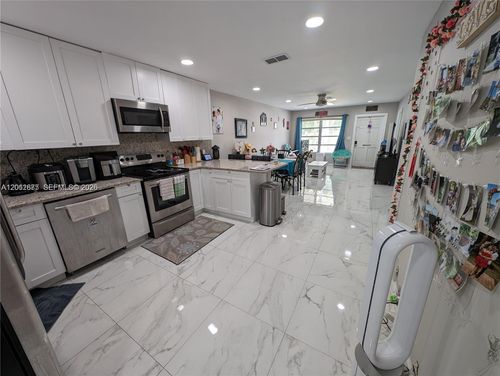 7761 Nw 42nd Pl, Coral Springs, FL, 33065-1945 | Card Image