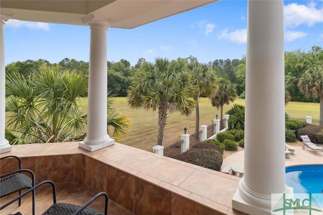 The view of the back of the property is stunning from the balcony of the primary suite. | Image 23