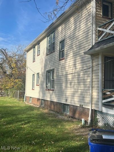 View of side of home with a yard | Image 3