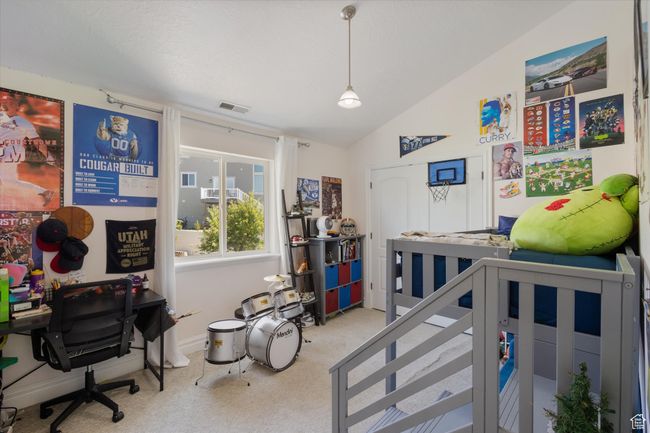 Bedroom with lofted ceiling and access to Jack and Jill bathroom | Image 16