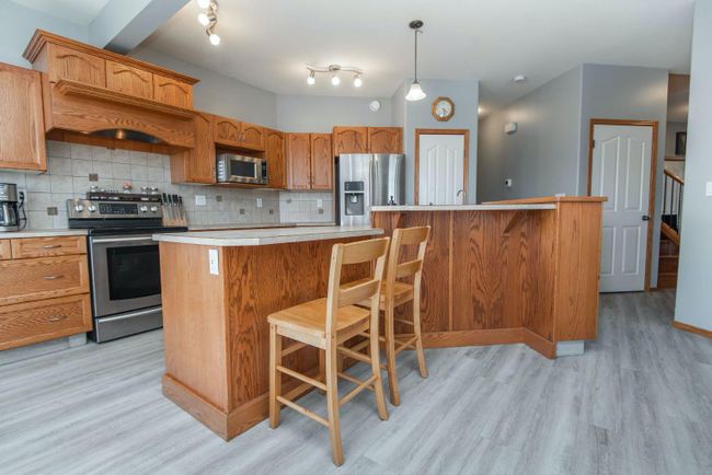64 Kensington Close, Home with 5 bedrooms, 3 bathrooms and 3 parking in Red Deer AB | Image 8