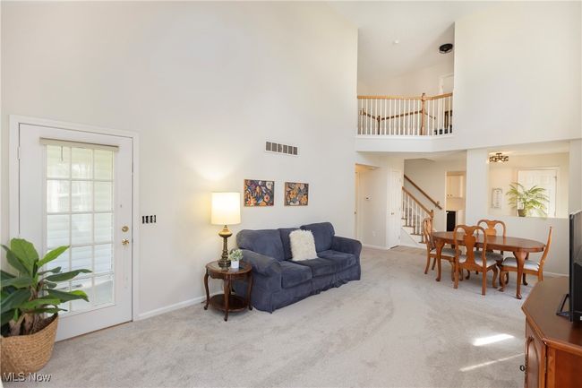 Volume ceilings allow for views from the 2nd floor hallway | Image 9