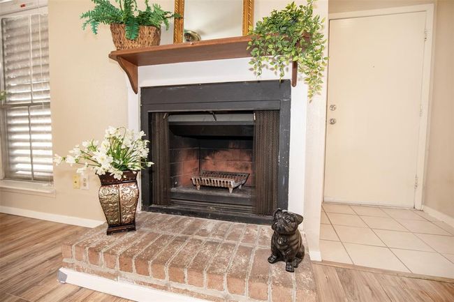 The wood burning fireplace will keep you warm on a cold winter night. | Image 9