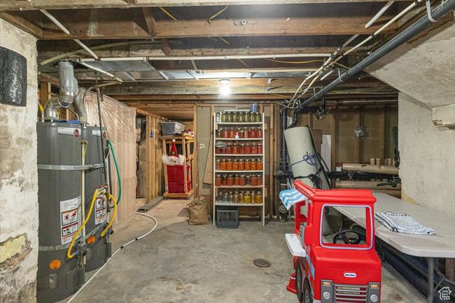 Basement with secured water heater | Image 33