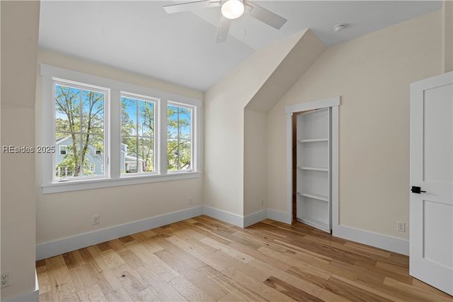Bedroom 4 with Hidden Bookcase Door to Closet | Image 47