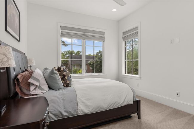 Another secondary bedroom with access to a private bathroom. | Image 42