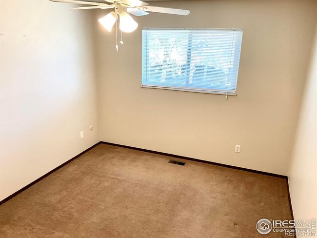 Upstairs Bedrooms with Windows Looking over Backyard | Image 18
